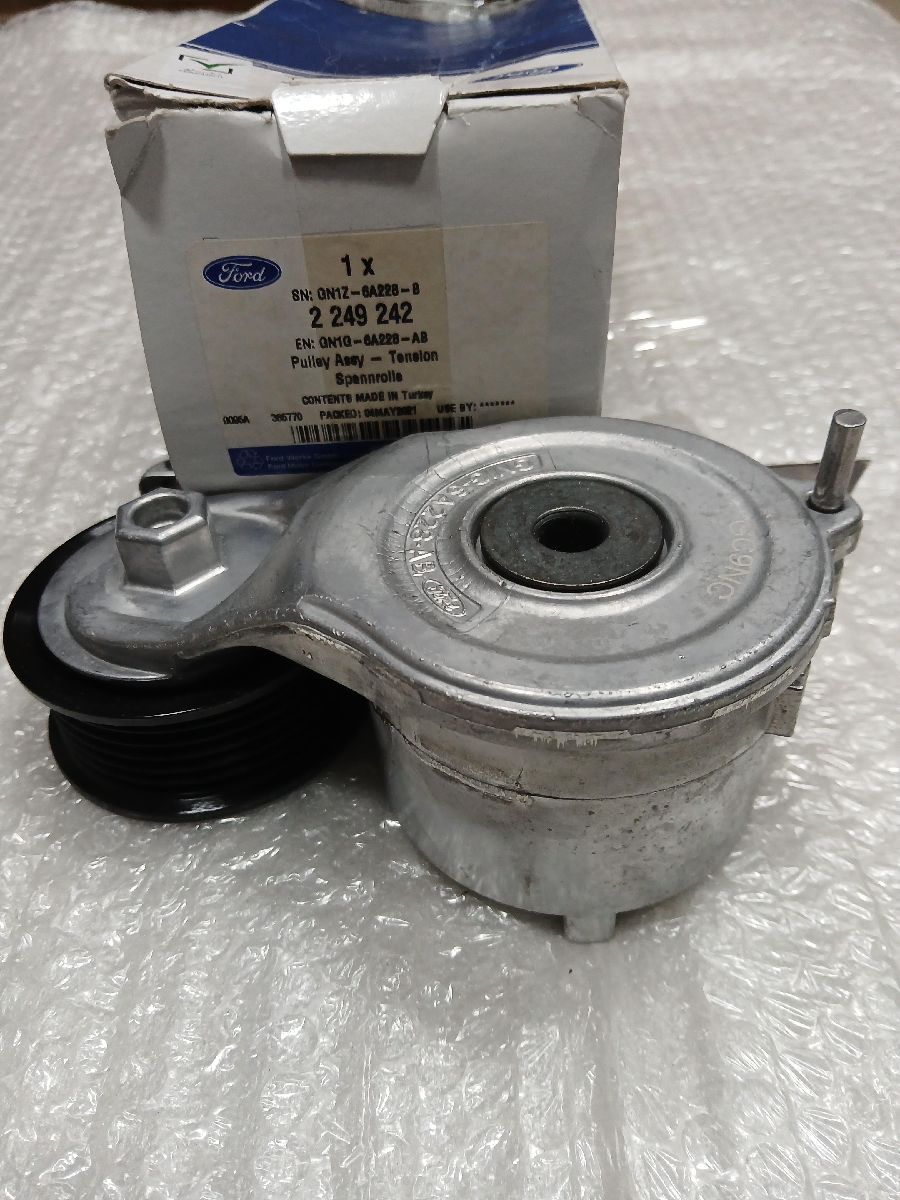 Натяжний ролик