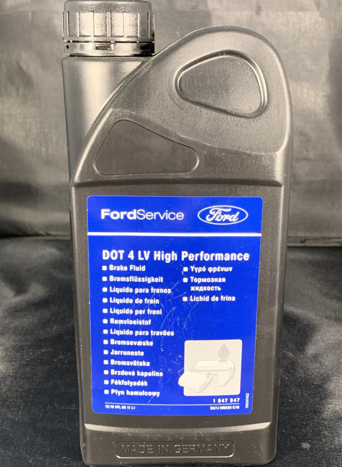 Тормозная жидкость 1л (код запчасти 1847947) на Ford: купить Тормозная ...