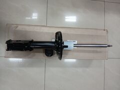 Левый передний амортизатор