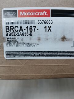 Трос стояночного тормоза