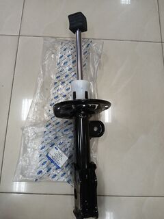 Амортизатор передній лівий